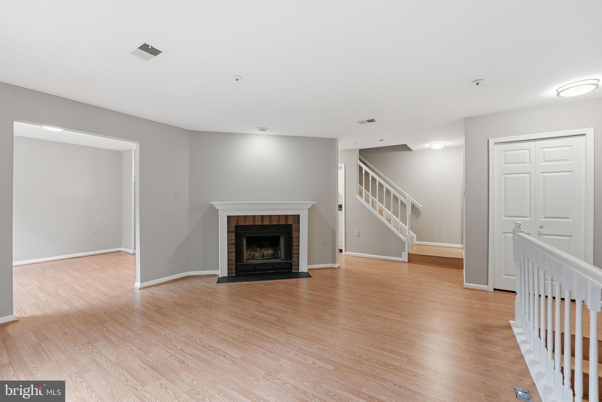 11129 Halterpath Trail Manassas, VA 20109 - Photo 3 of 28 Sun-Filled Living Room with Wood Burning Fireplace