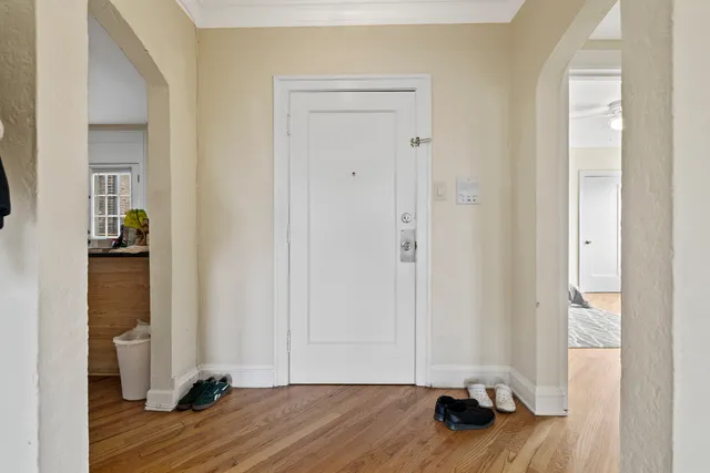 a view of a room with wooden floor and closet