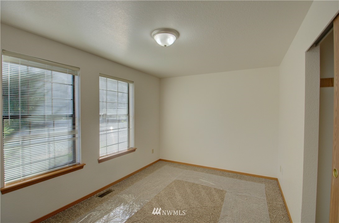 1820 Diamond Loop Southeast Lacey, WA 98503 - Photo 12 of 17 an empty room with windows