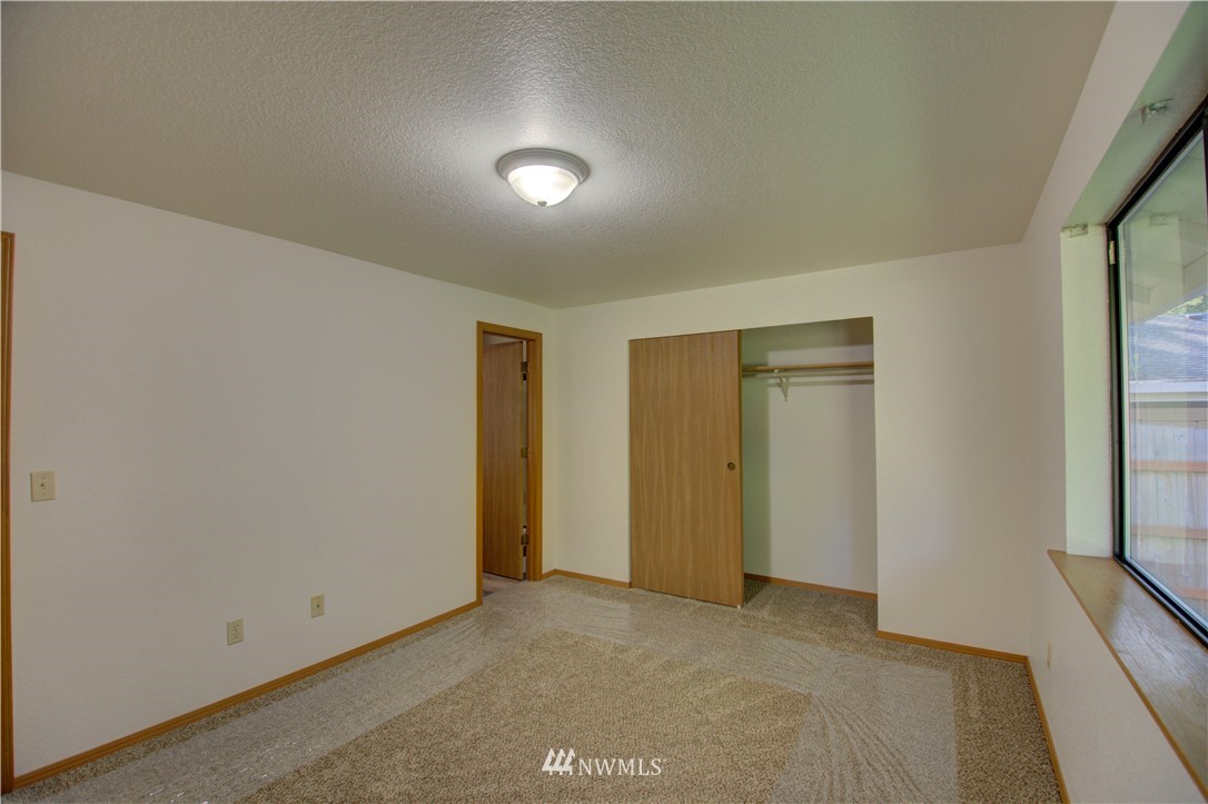 1820 Diamond Loop Southeast Lacey, WA 98503 - Photo 10 of 17 an empty room with windows