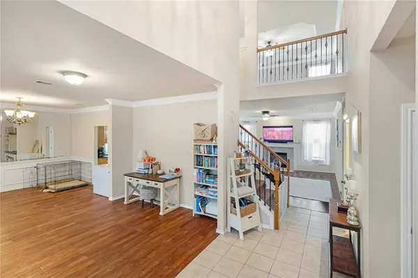 a room with furniture and white walls