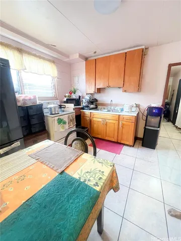 a living room with a rug floor and a table