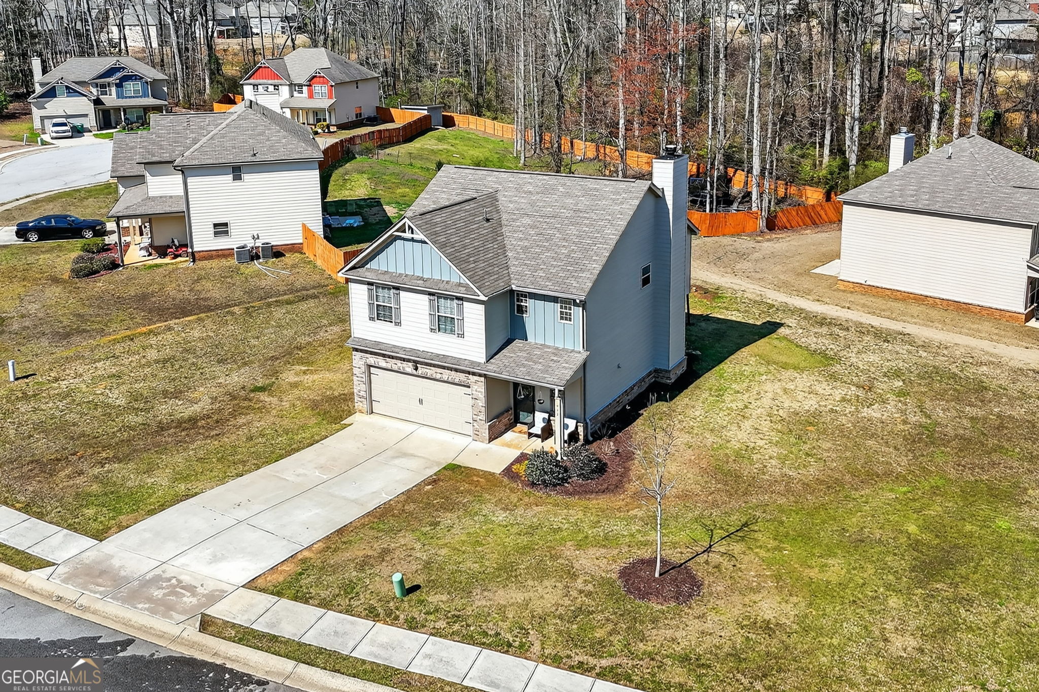 482 Louise Way Locust Grove, GA 30248 - Photo 2 of 29 a view of a house with outdoor space