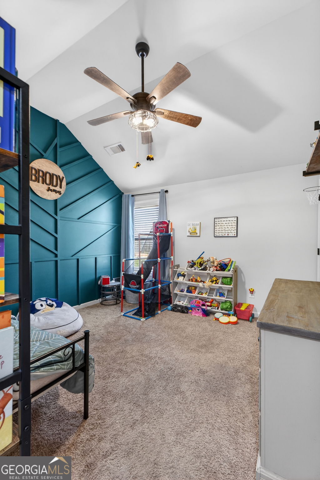 482 Louise Way Locust Grove, GA 30248 - Photo 21 of 29 a bedroom with furniture and a ceiling fan