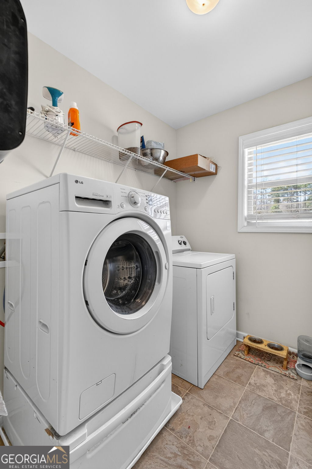 482 Louise Way Locust Grove, GA 30248 - Photo 23 of 29 a utility room with dryer and washer