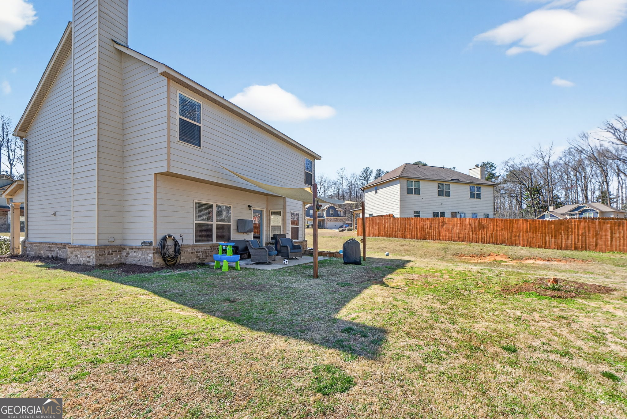 482 Louise Way Locust Grove, GA 30248 - Photo 26 of 29 a view of a house with swimming pool and sitting area