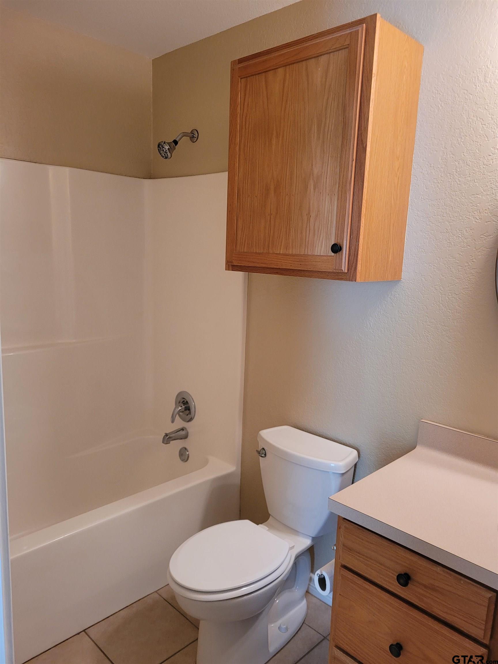19054 County Road 1202 Flint, TX 75762 - Photo 12 of 19 a white toilet sitting next to a bath tub