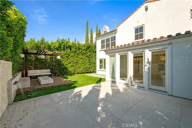 a house view with a garden space