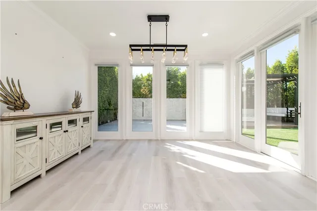 a view of a kitchen with electric appliances