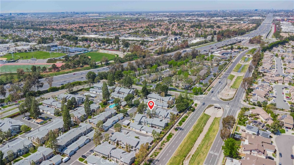 498 Monroe, Unit 15 Irvine, CA 92620 - Photo 26 of 26 an aerial view of a city with lots of residential buildings