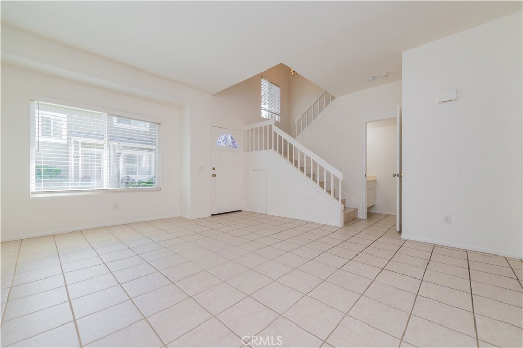 498 Monroe, Unit 15 Irvine, CA 92620 - Photo 4 of 26 a view of an empty room with windows