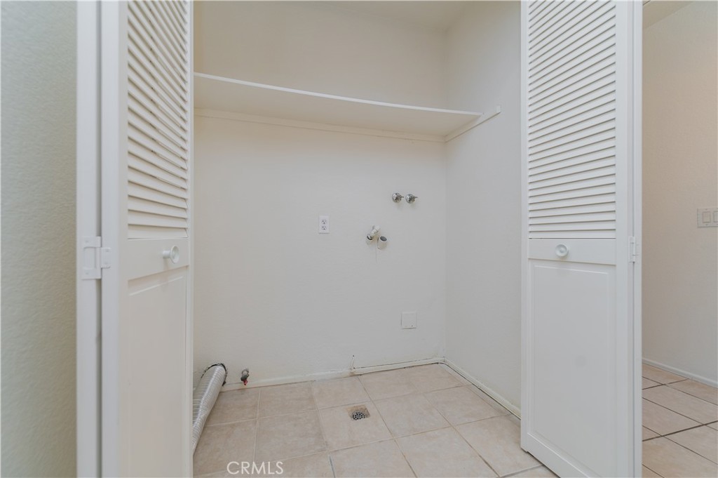 498 Monroe, Unit 15 Irvine, CA 92620 - Photo 10 of 26 a view of a room with white walls