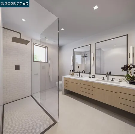a large bathroom with a double vanity sink mirror and shower