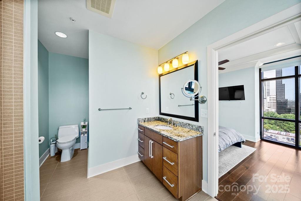 222 South Caldwell Street, Unit 1509 Charlotte, NC 28202 - Photo 14 of 27 a utility room with dryer and washer