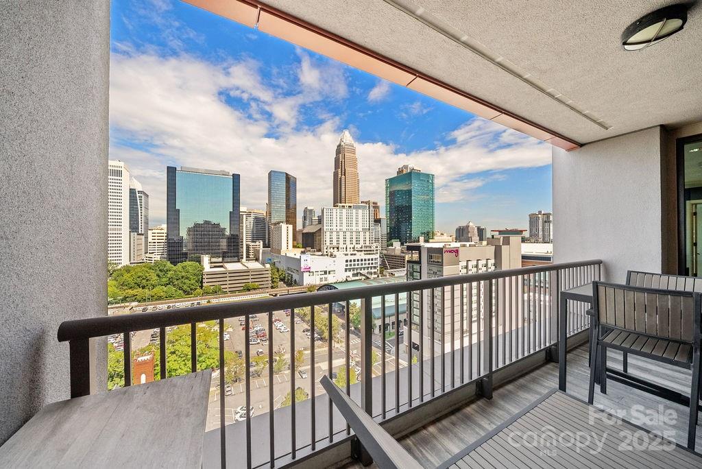222 South Caldwell Street, Unit 1509 Charlotte, NC 28202 - Photo 18 of 27 a view of city from a balcony