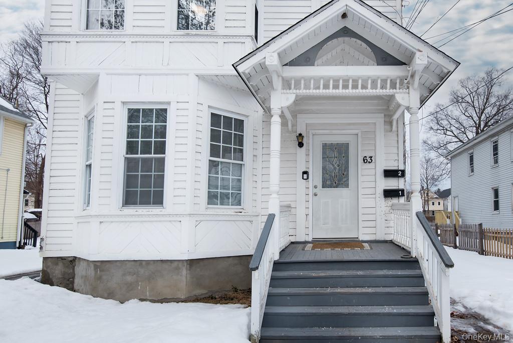 63 Thompson Street Poughkeepsie, NY 12601 - Photo 2 of 19 Beautiful Open porch Entrance with Original Millwork and Large Windows