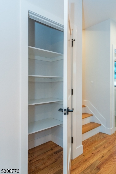 360 Orange Road, Unit 1 Montclair, NJ 07042 - Photo 16 of 41 a view of a hallway with wooden floor and closet