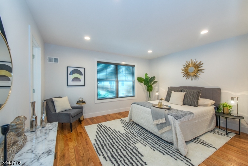 360 Orange Road, Unit 1 Montclair, NJ 07042 - Photo 26 of 41 a living room with furniture and a rug