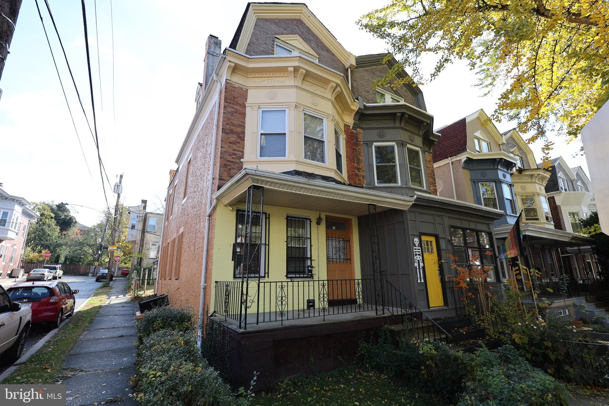 76 West Sharpnack Street Philadelphia, PA 19119 - Photo 14 of 14 a front view of a house with a yard