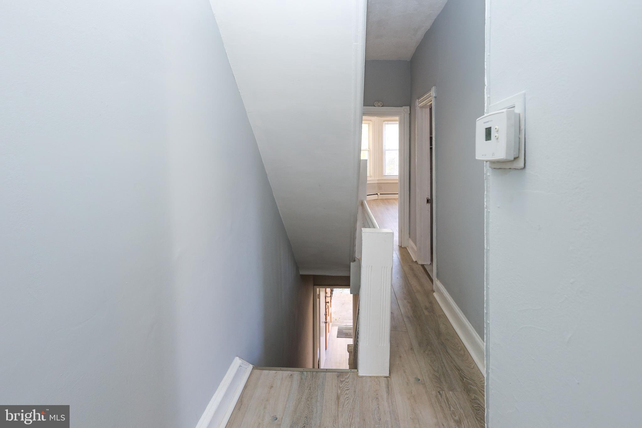76 West Sharpnack Street Philadelphia, PA 19119 - Photo 4 of 14 a view of entryway with wooden floor