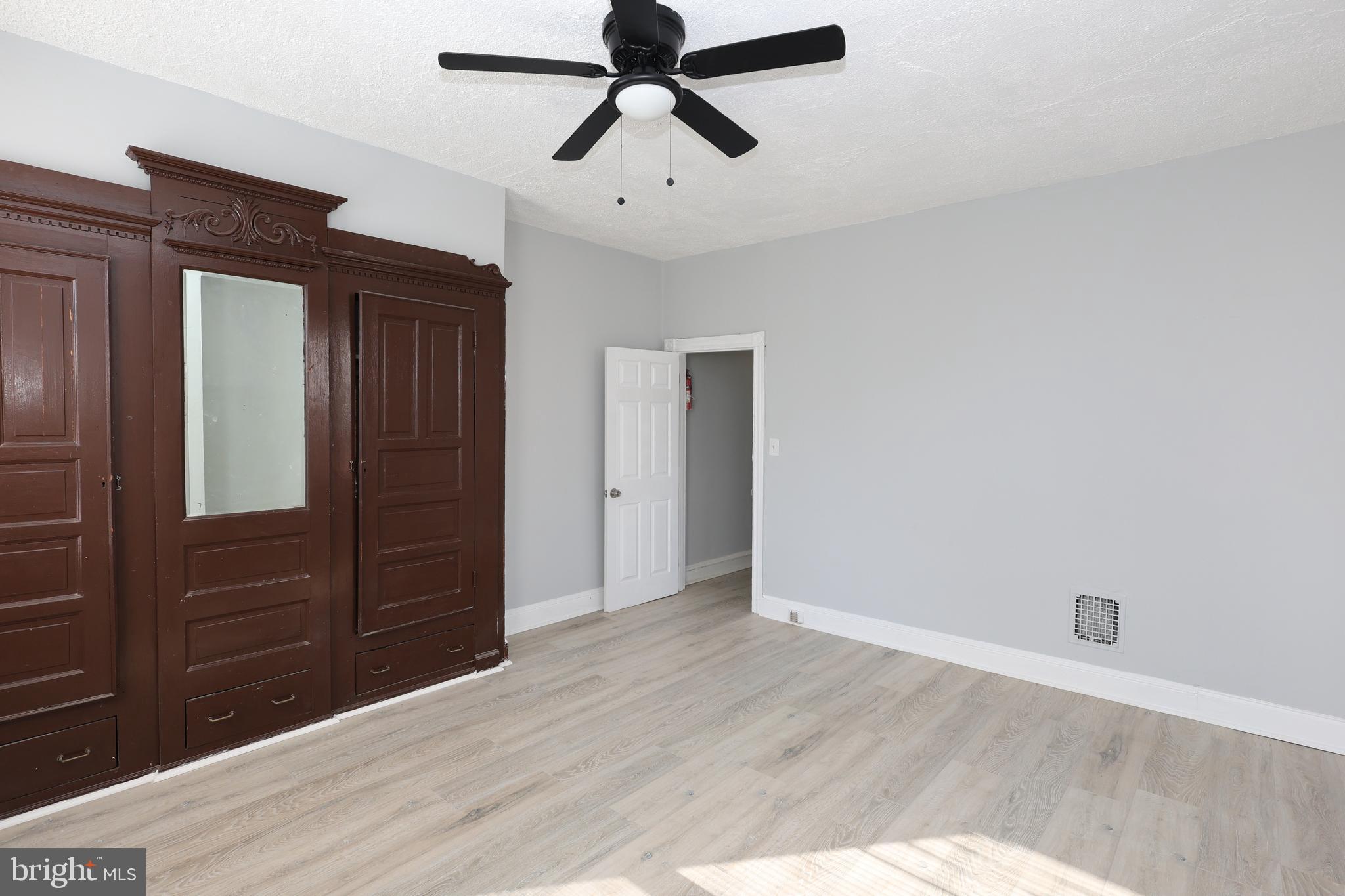 76 West Sharpnack Street Philadelphia, PA 19119 - Photo 6 of 14 wooden floor in an empty room