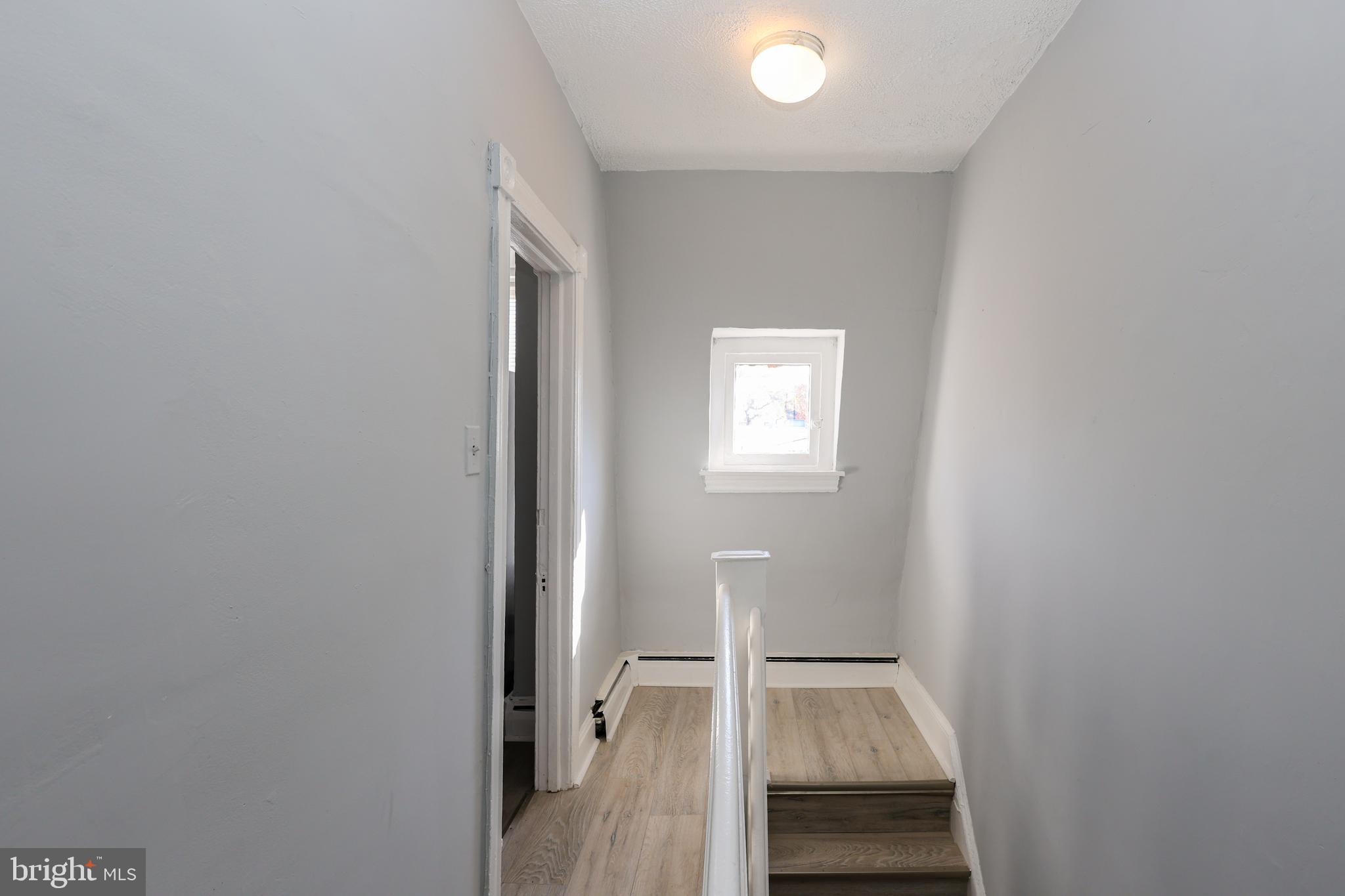 76 West Sharpnack Street Philadelphia, PA 19119 - Photo 9 of 14 a view of an empty room and a gallery