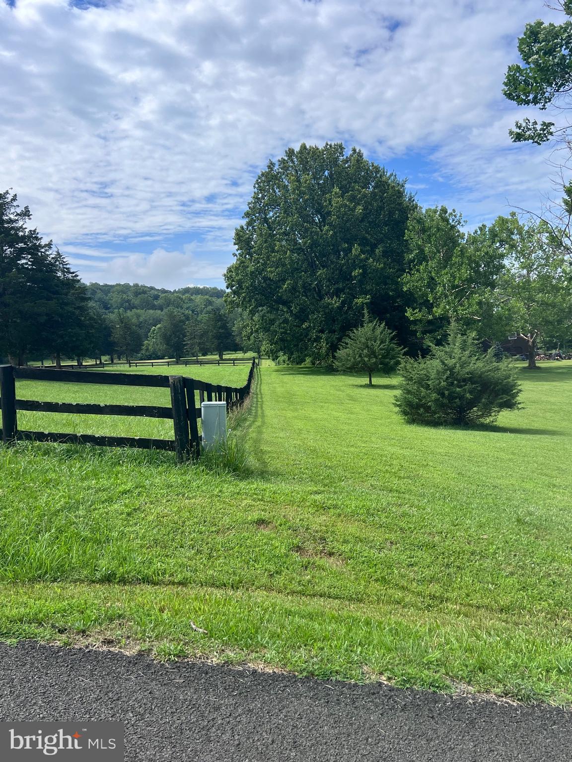 5377 Colt Drive Broad Run, VA 20137 - Photo 14 of 45 a view of a garden with a bench in the background