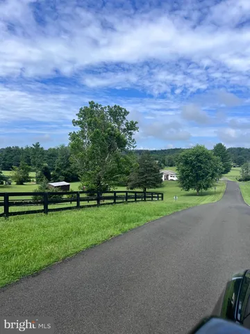 a view of a golf course with a garden
