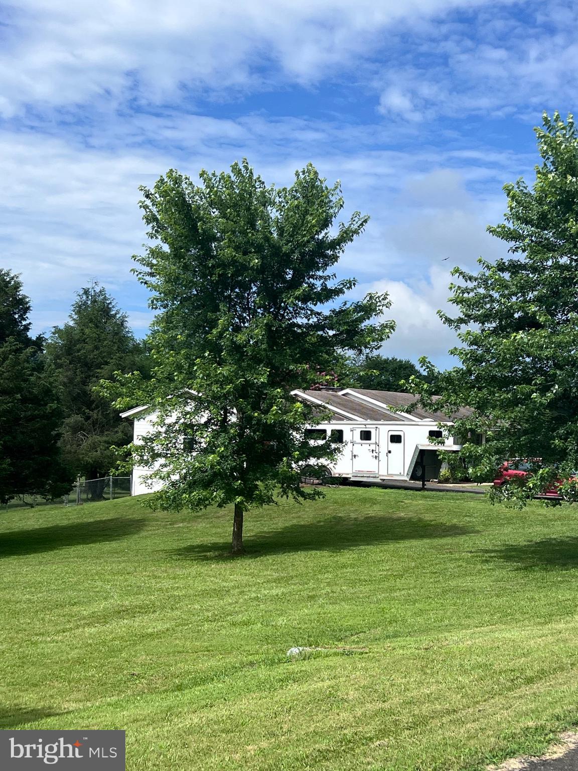 5377 Colt Drive Broad Run, VA 20137 - Photo 16 of 45 a view of a lake with a big yard
