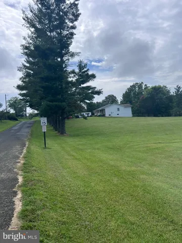 a view of a golf course with a lake