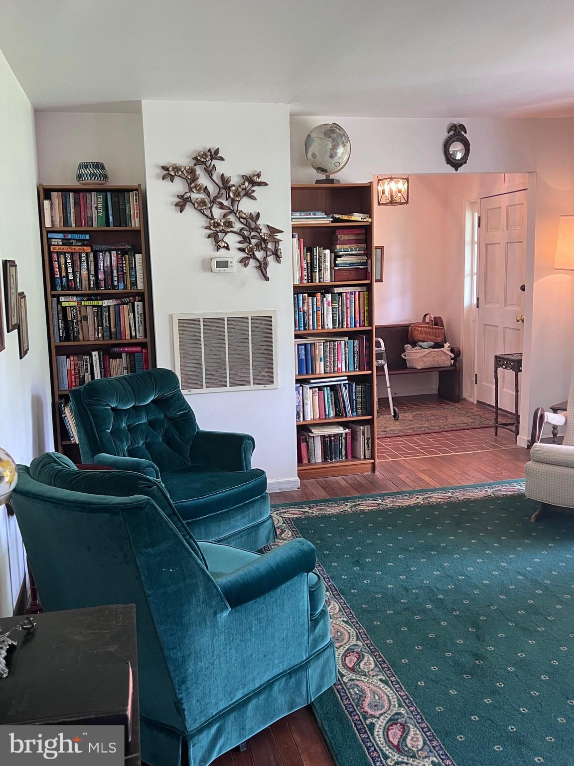 5377 Colt Drive Broad Run, VA 20137 - Photo 24 of 45 a living room with furniture and a book shelf