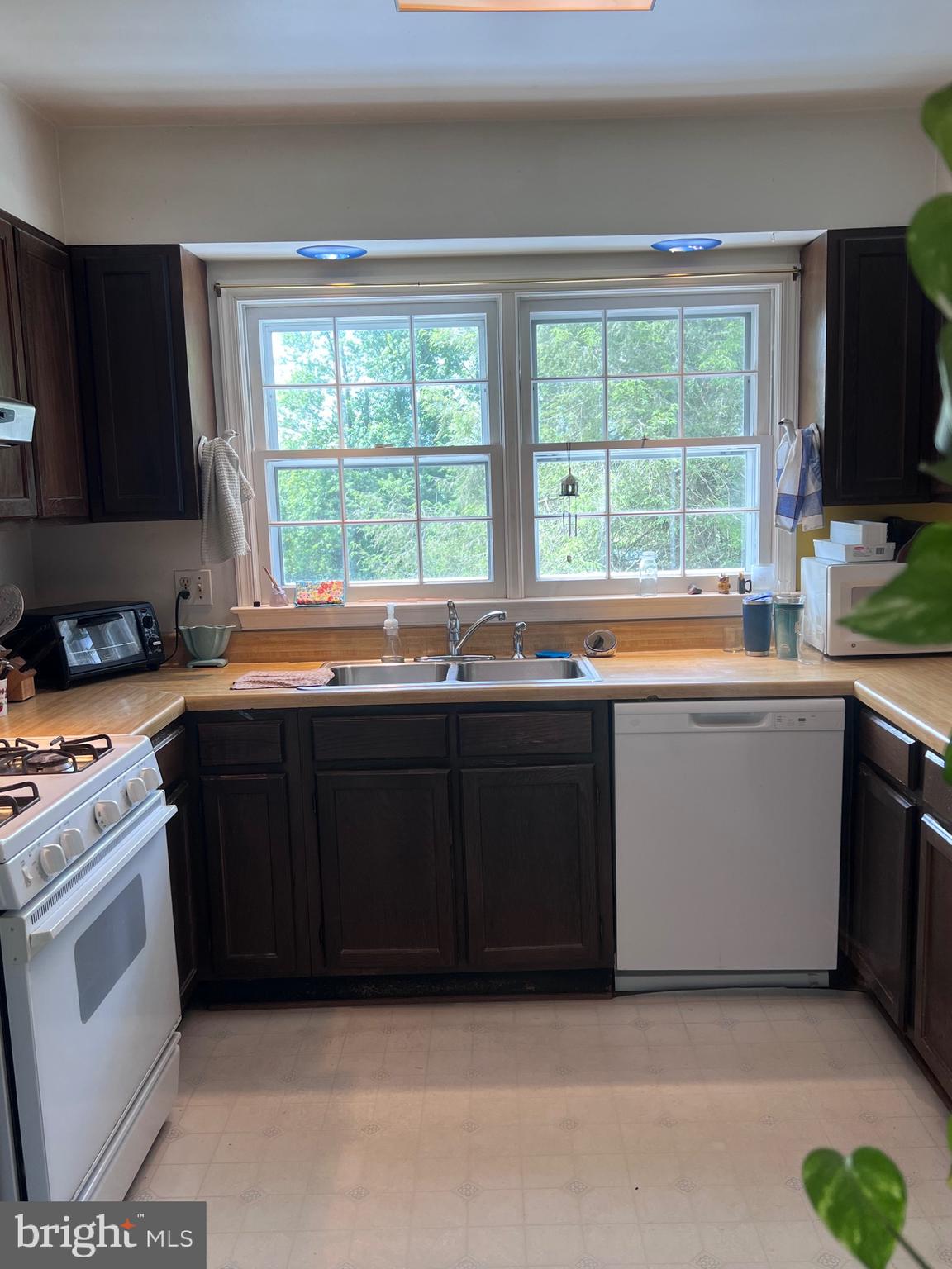 5377 Colt Drive Broad Run, VA 20137 - Photo 28 of 45 a kitchen with a sink and a stove top oven