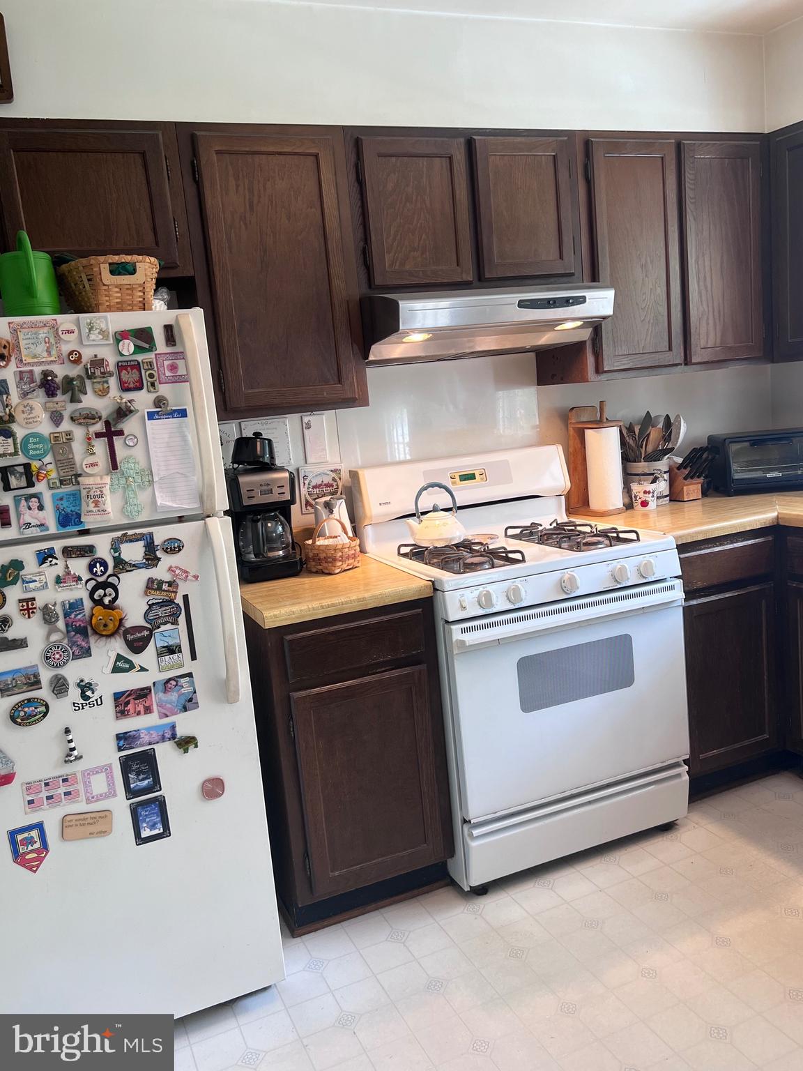 5377 Colt Drive Broad Run, VA 20137 - Photo 32 of 45 a kitchen with a stove and a microwave