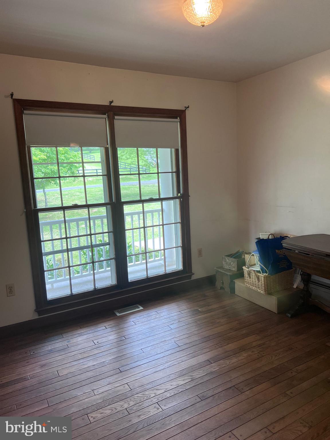 5377 Colt Drive Broad Run, VA 20137 - Photo 37 of 45 a view of an empty room with wooden floor and a window