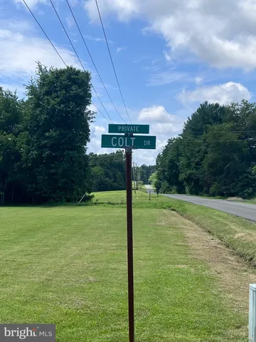 a view of a patio with a yard