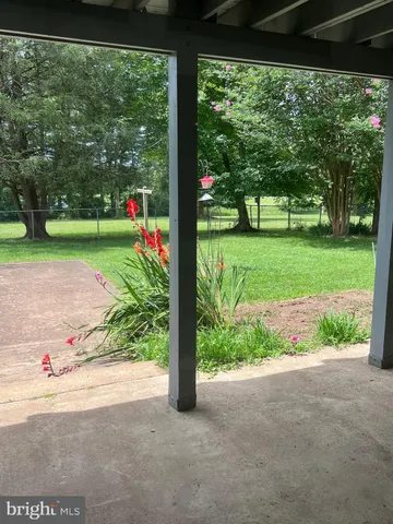 a view of a house with a back yard