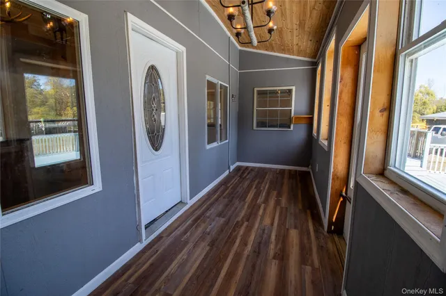 a view of a house with wooden floor