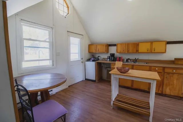 a view of balcony and wooden floor