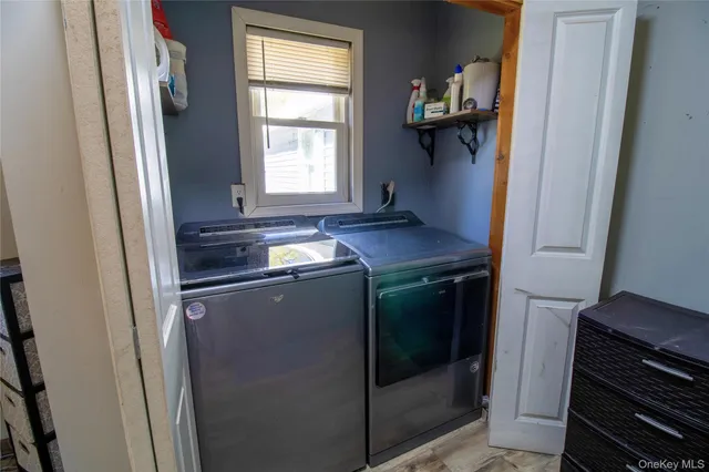 a kitchen with a refrigerator and a sink