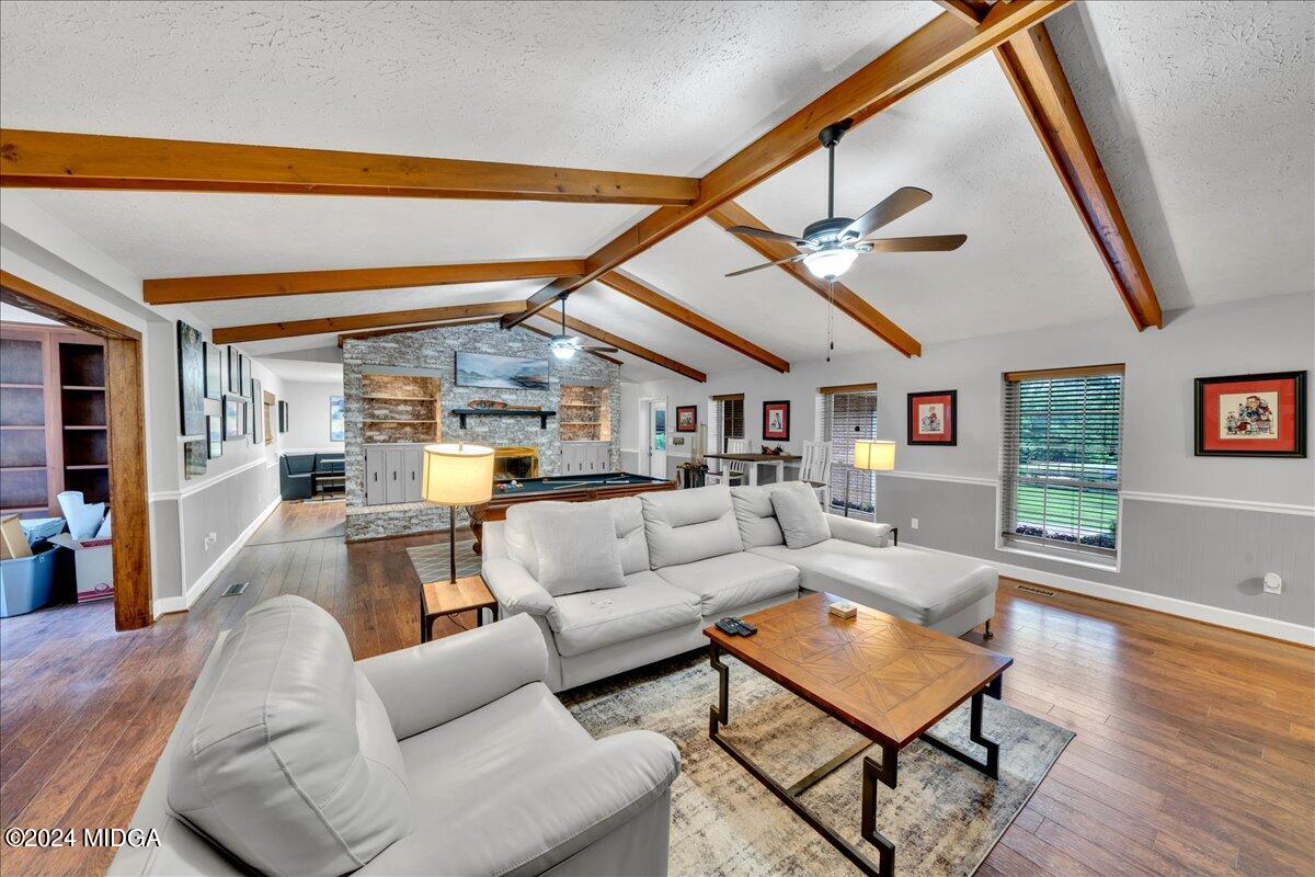 474 Plantation Road Gray, GA 31032 - Photo 20 of 64 a living room with furniture and wooden floor