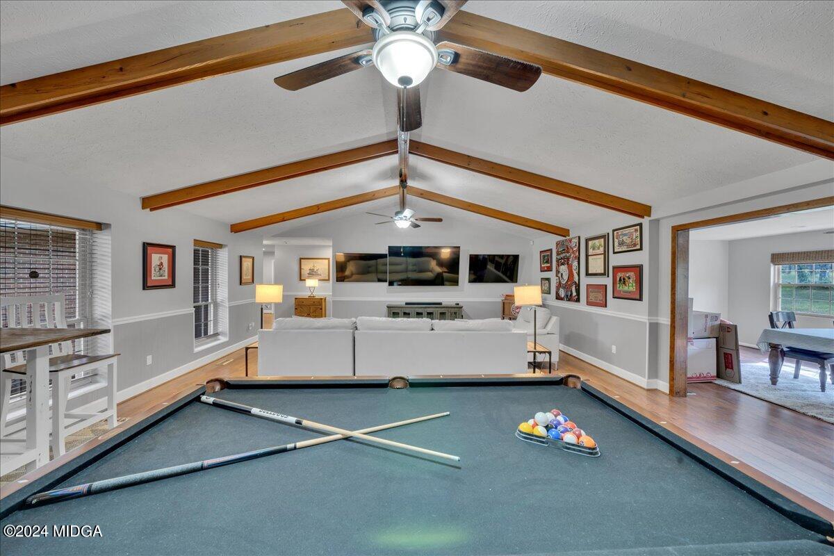 474 Plantation Road Gray, GA 31032 - Photo 23 of 64 a living room with furniture and a chandelier