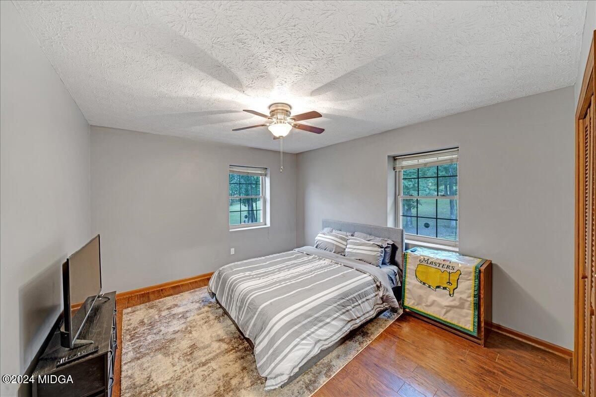 474 Plantation Road Gray, GA 31032 - Photo 42 of 64 a bedroom with a bed and a window