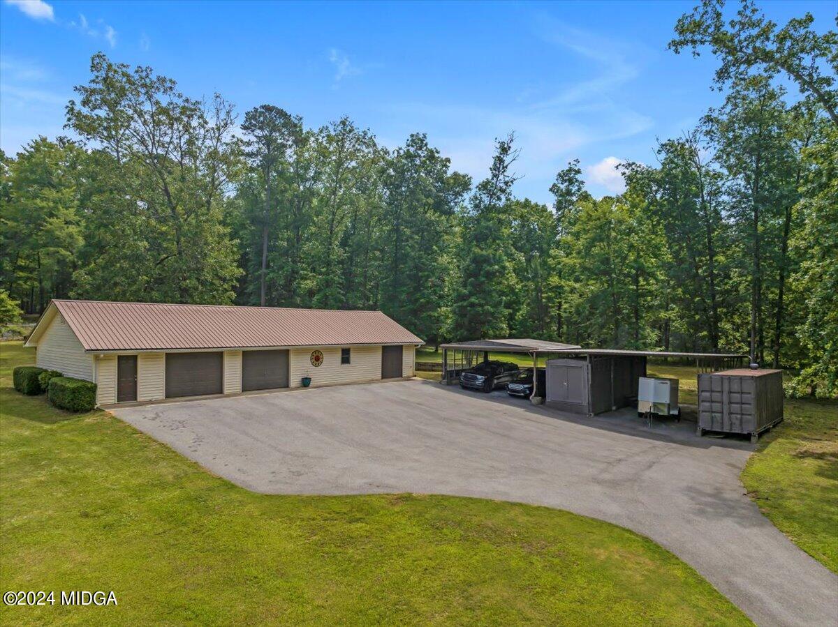 474 Plantation Road Gray, GA 31032 - Photo 52 of 64 a view of house with yard and entertaining space