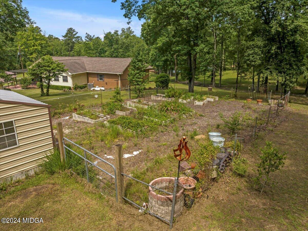 474 Plantation Road Gray, GA 31032 - Photo 60 of 64 a view of a yard with chairs