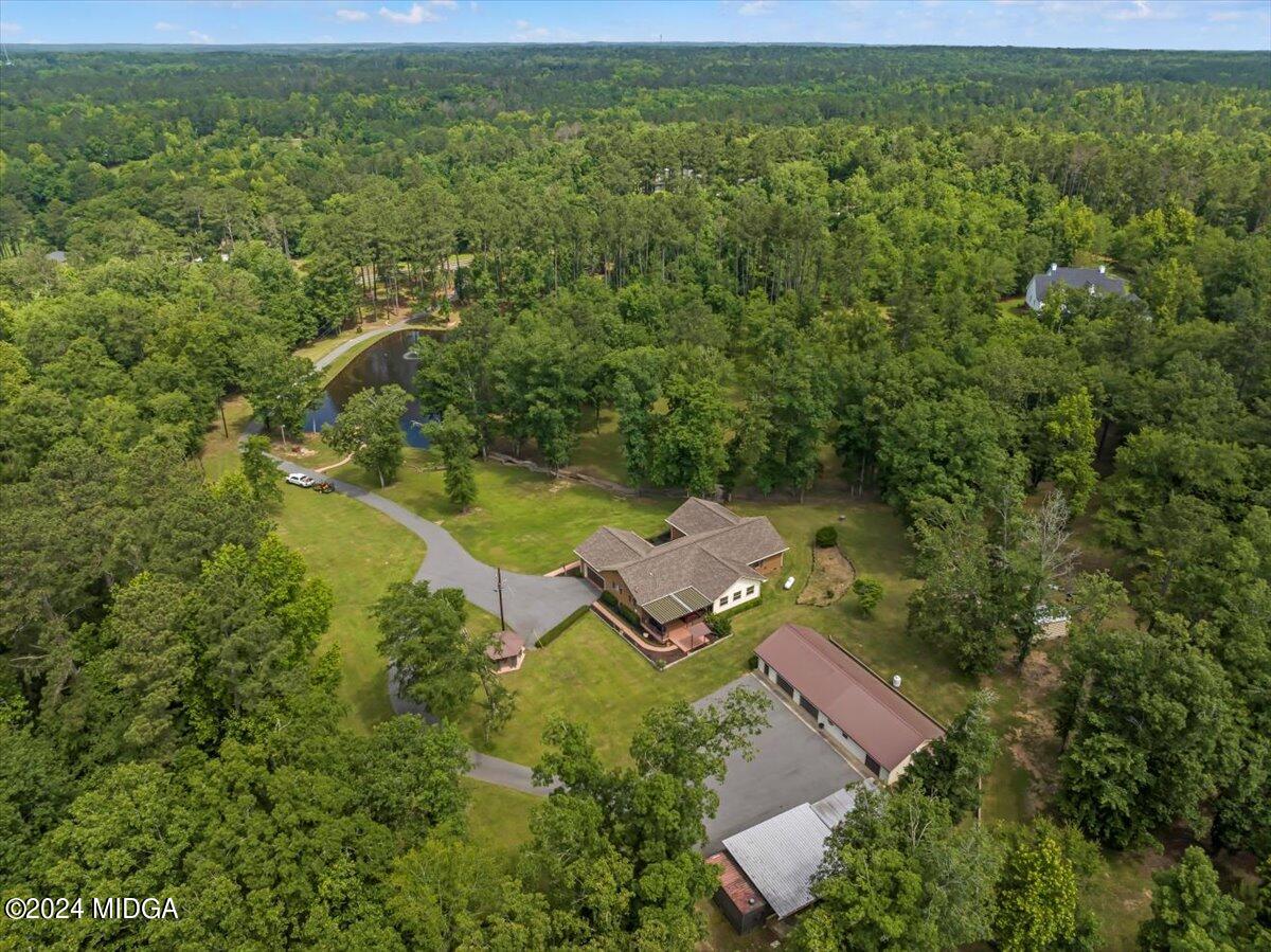 474 Plantation Road Gray, GA 31032 - Photo 64 of 64 an aerial view of a house with a yard