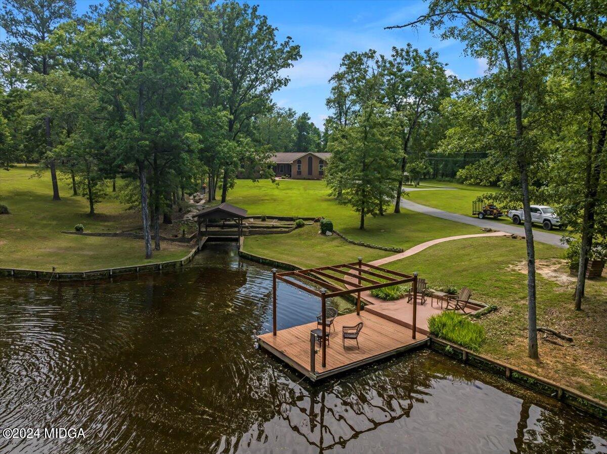 474 Plantation Road Gray, GA 31032 - Photo 10 of 64 a view of a swimming pool with a patio