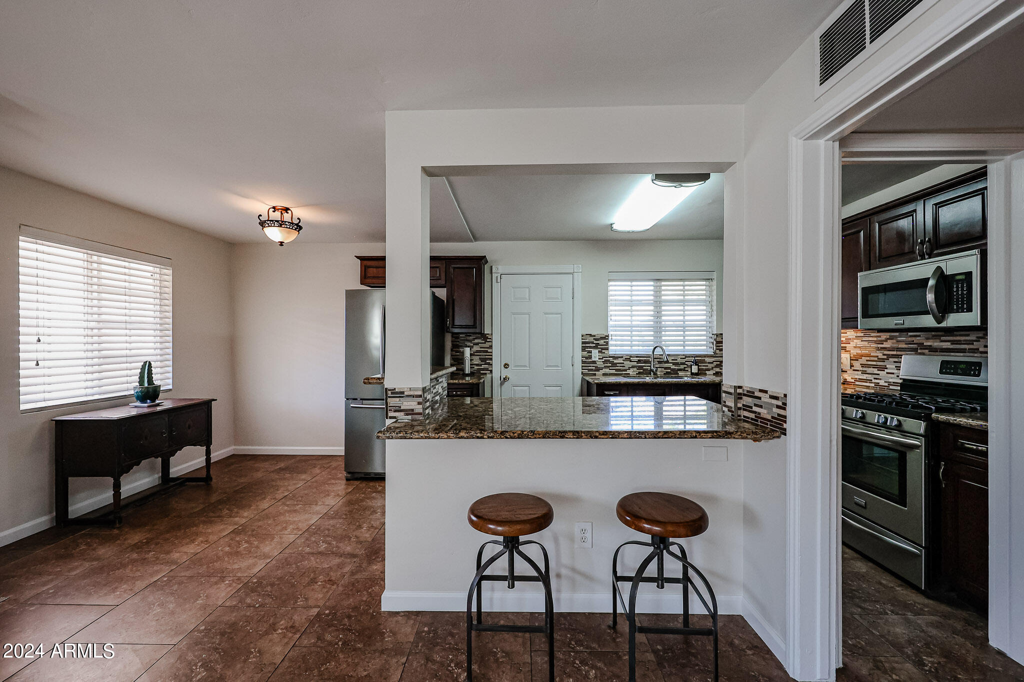 4634 East Almeria Road Phoenix, AZ 85008 - Photo 9 of 43 Approaching the Kitchen