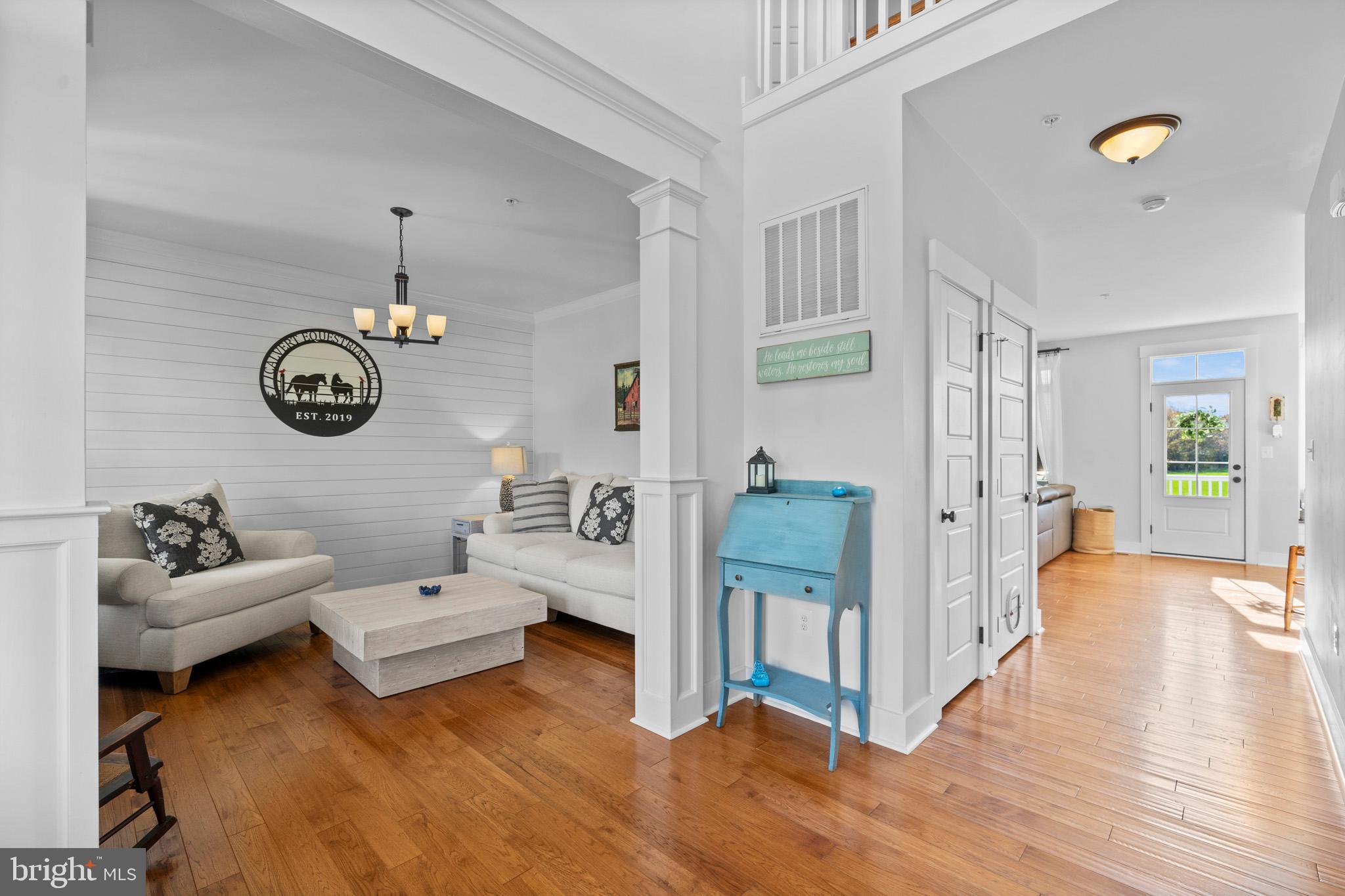 1965 Lowery Road Huntingtown, MD 20639 - Photo 11 of 54 a living room with furniture and wooden floor