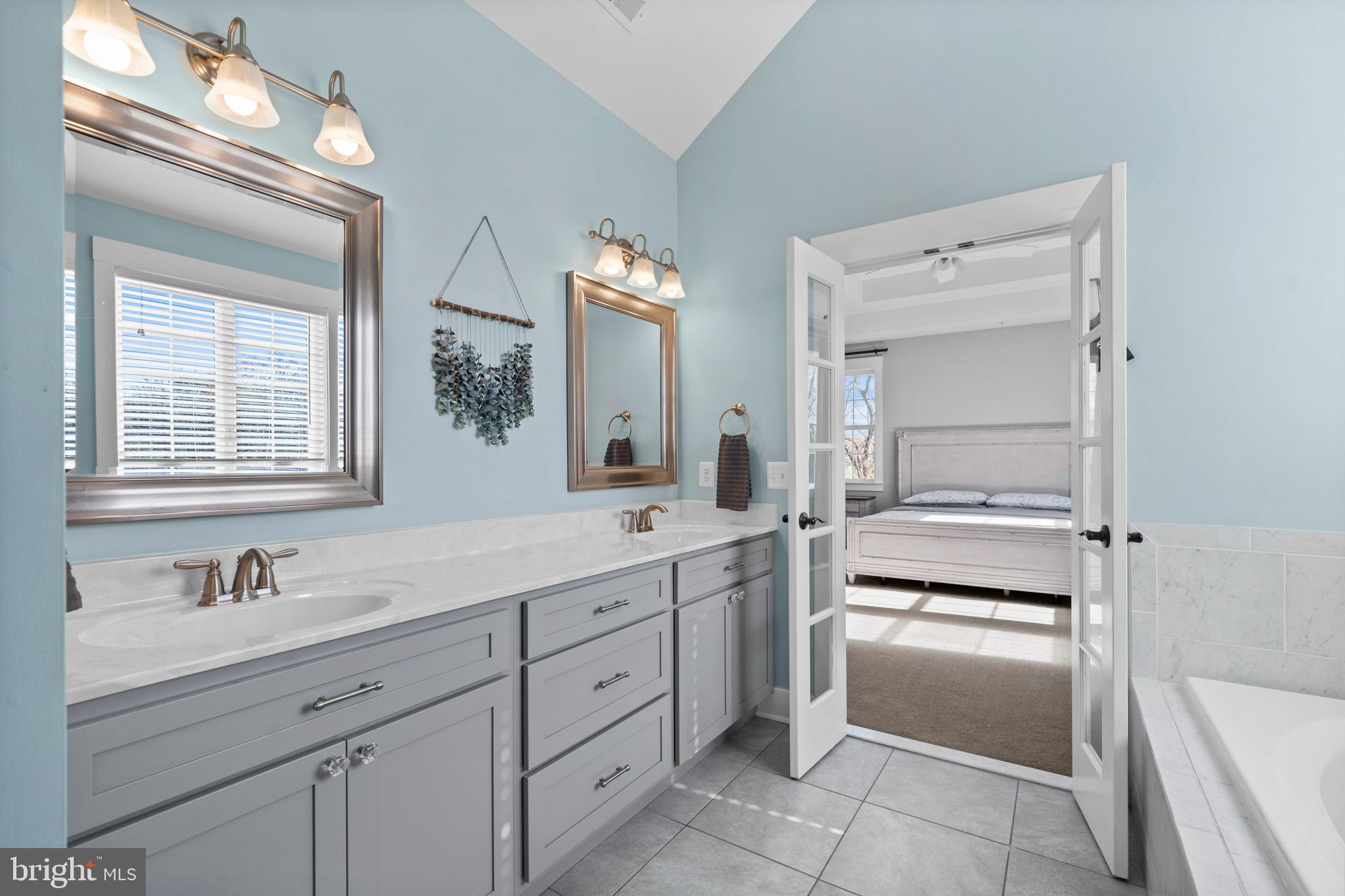 1965 Lowery Road Huntingtown, MD 20639 - Photo 31 of 54 a bathroom with a sink vanity and mirror