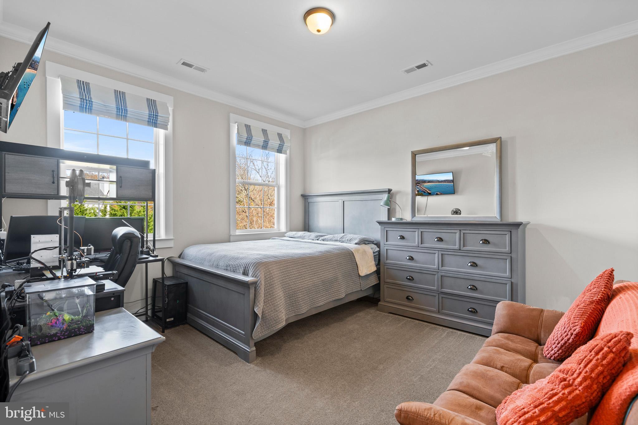 1965 Lowery Road Huntingtown, MD 20639 - Photo 37 of 54 a bedroom with a bed and furniture